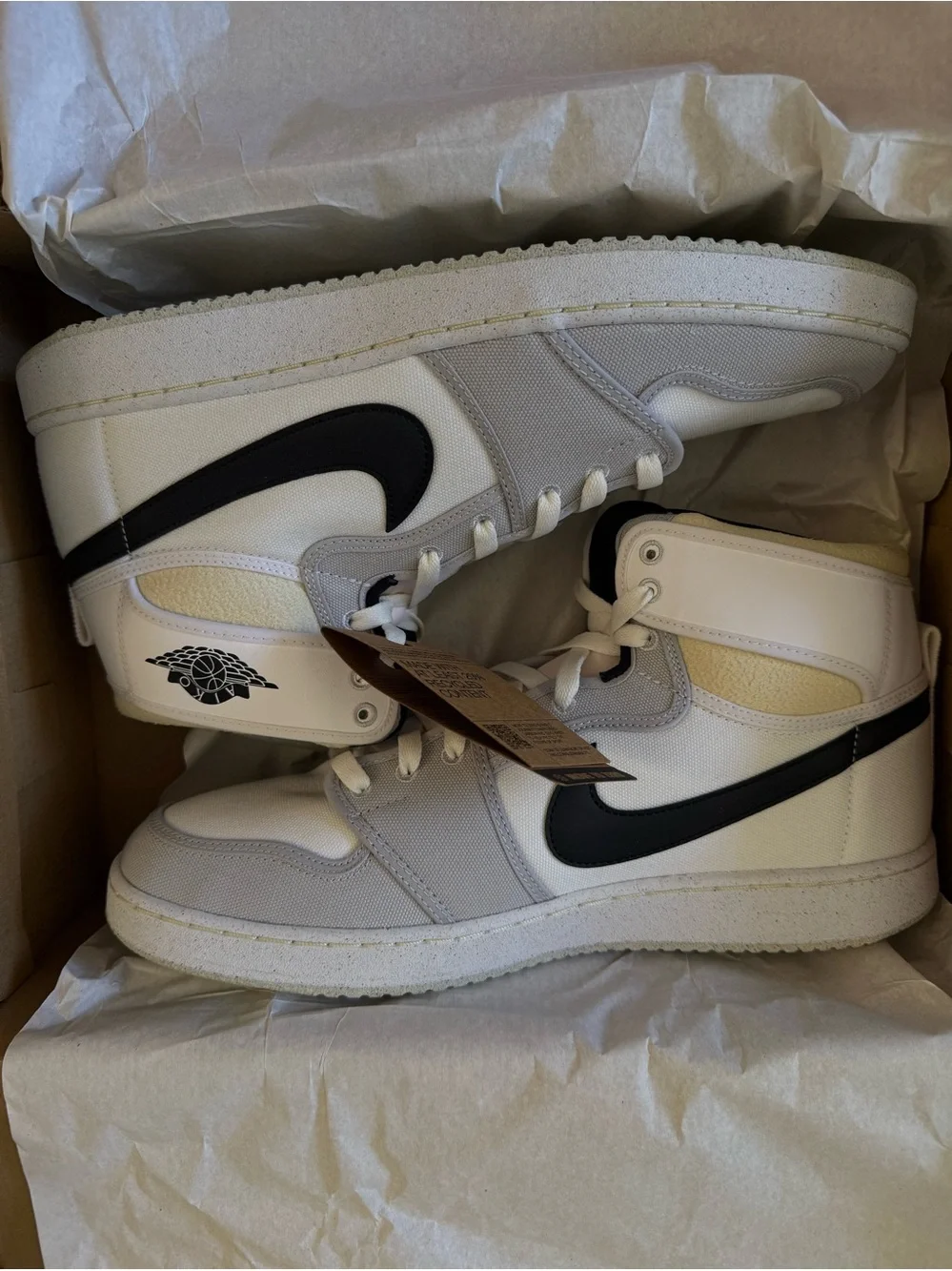 Jordan• 1 Retro AJKO in White, Black, Grey Fog Sail
